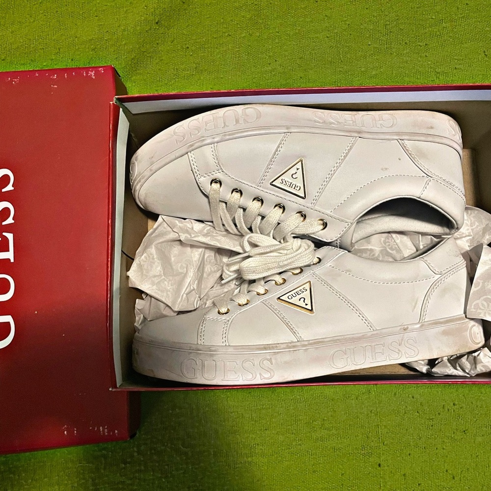 Beautiful used a few times Guess women sneakers.